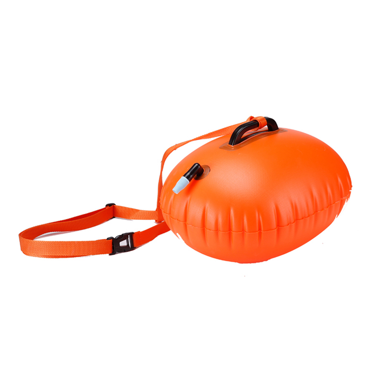 How do you use a swimming buoy?